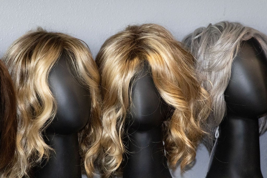 Custom hairpieces on display blocks