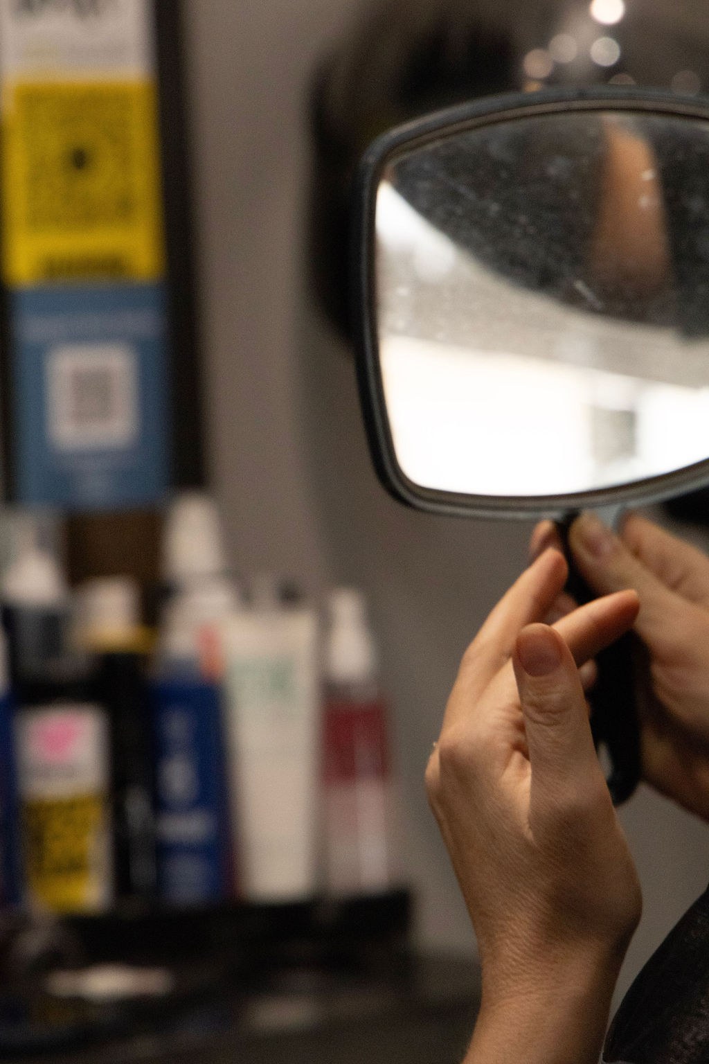 Colour matching a custom hairpiece at the mirror
