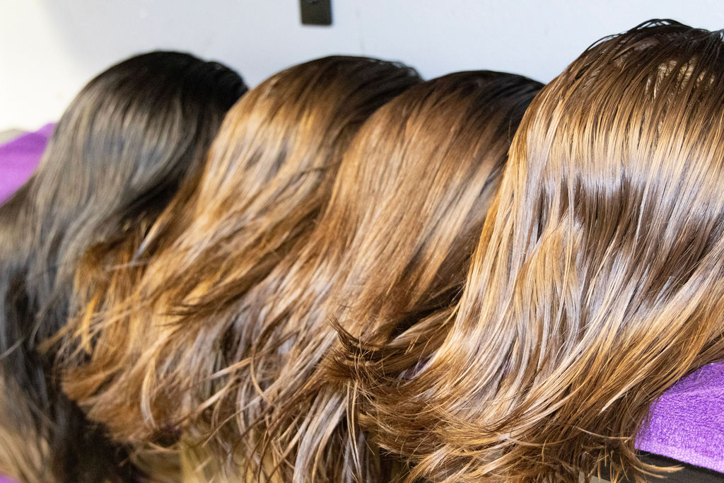 Detail of styled human hair on a hairpiece